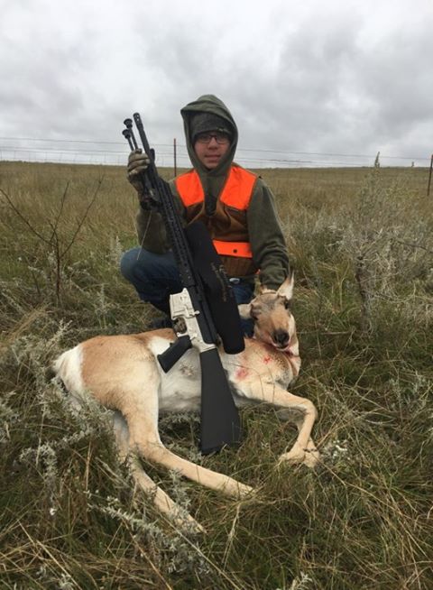 Boy with antelope